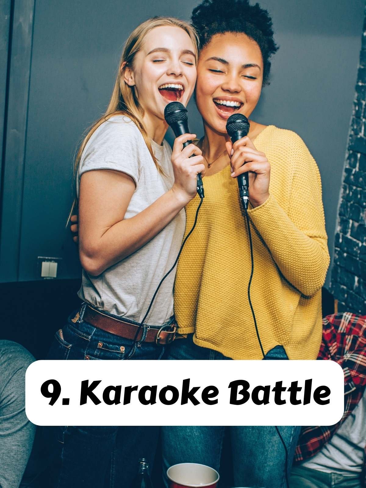 9. Karaoke battle. Photo of two friend singing karaoke